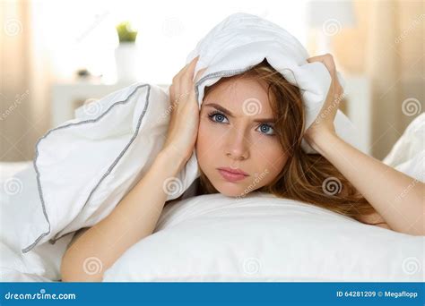 Young Beautiful Woman Lying In Bed Suffering With Insomnia Stock Image