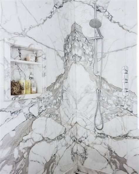 Marble Clad Walk Shower Is Fitted With Calcutta Marble Shower Tiles