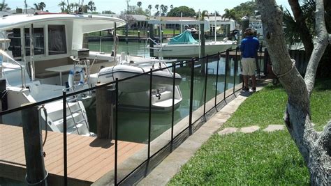 Public swimming pools in florida must be in compliance with the virginia graeme baker federal pool and spa safety act signed by the u.s. Pool fence install on sea wall | Florida pool, Pool fence ...