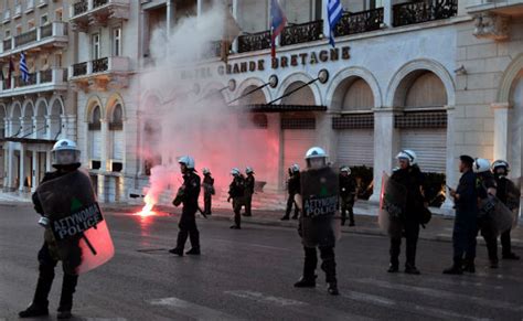 Police Fire Tear Gas At Protesters Outside Greek Parliament Report