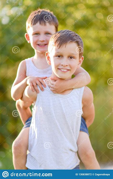 Portrait Of Two Boys In The Summer Stock Photo Image Of Spring