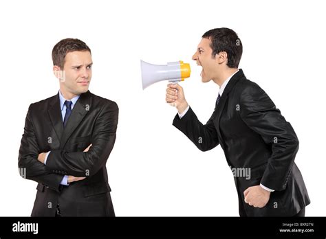 Angry Businessman Yelling Via Megaphone To Another Man Stock Photo Alamy