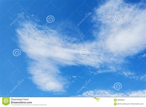 Beautiful White Clouds Over A Deep Blue Background Stock Photo Image
