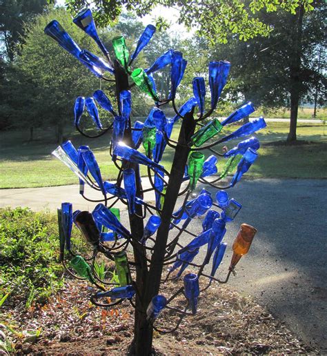 My Dream For My Back Yarda Bottle Tree With Blue Bottles To Catch The