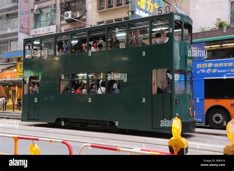Green Old Double Decker Tram In Downtown Hong Kong Stock Photo Alamy