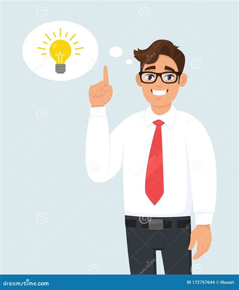 Happy Young Business Man Pointing Up Light Bulb Representing Idea