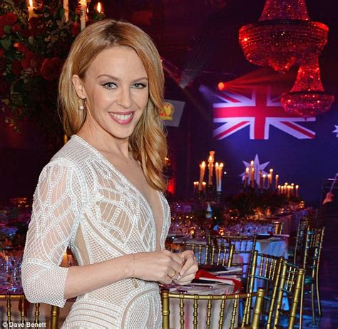 Kylie Minogue Stuns In Plunging Semi Sheer Gown As She Is Named Australian Of The Year In The Uk