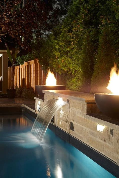 Double Excitement With These Swimming Pool Waterfall Ideas