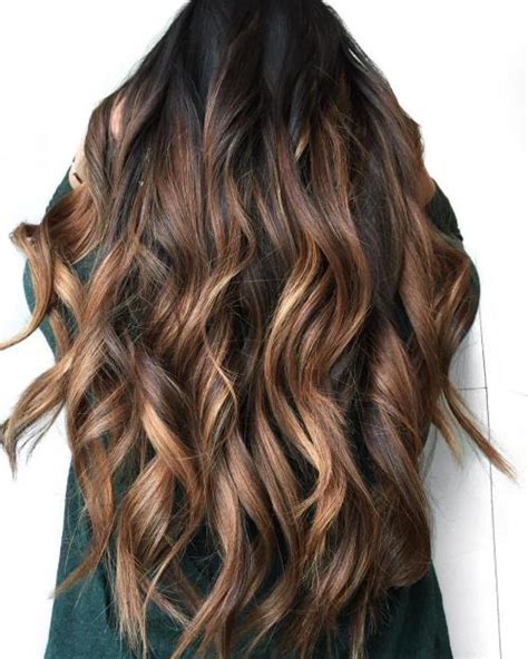 Her black hair is broken up by some dark brown sugar highlights; 70 Balayage Hair Color Ideas with Blonde, Brown and ...