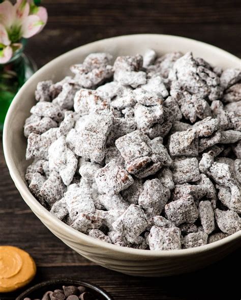 The shape of the pieces coated in chocolate resembles dog food. puppy chow chex mix recipe