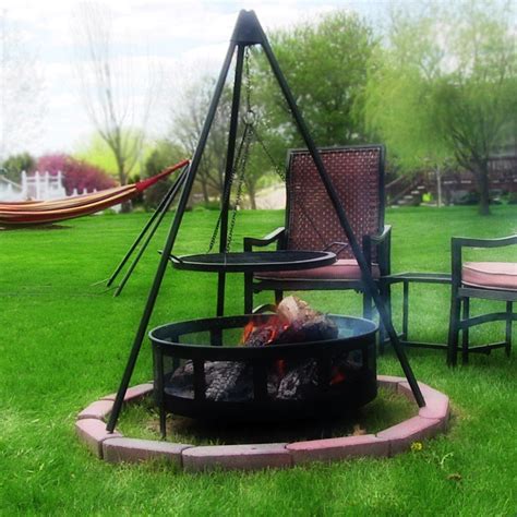 Another great way to cook nearly anything on a fire pit is with a simple metal grate placed over the fire. Fire Pit Tripod Grill with 22" Cooking Grate by Sunnydaze ...