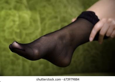 Sexy Female Feet Black Stockings On Stock Photo 673979884 Shutterstock