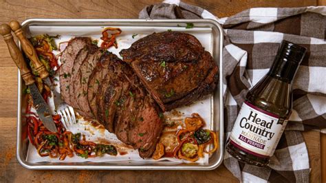 Place beef tenderloin in a shallow baking dish and dot with 2 tablespoons butter. Smoked Marinated Beef Tenderloin with Head Country All-Purpose Marinade How-To