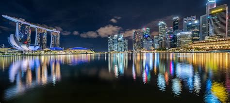 1600x720 Singapore Building Reflection On Lake 1600x720 Resolution