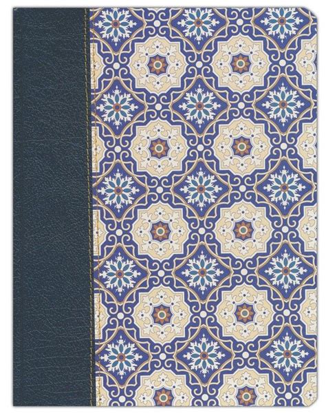A Blue And White Book With An Intricate Design