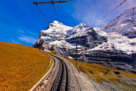 Jungfrau Railway Train Climbing From Kleine Scheidegg To Eigergletscher