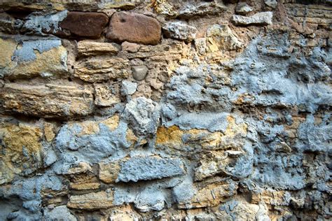 Background Texture Of A Weathered Stone Wall Stock Image