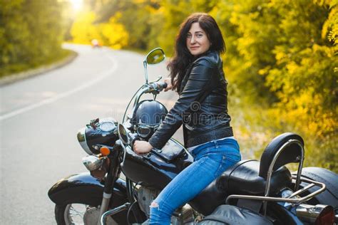 Attractive Brunette Motorcyclist Sits On A Motorcycle Stock Image Image Of Biker Attractive