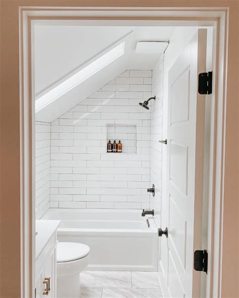 If these walls could talk: upstairs bathroom reveal | Sloped ceiling bathroom, Small ...