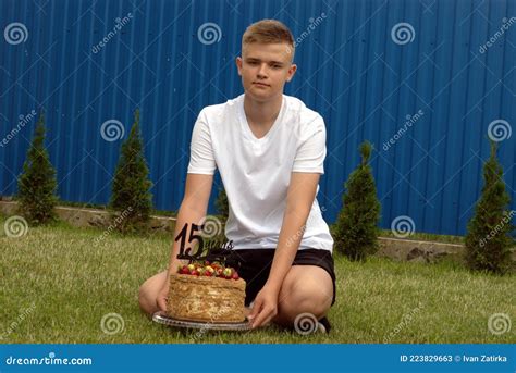 Portrait Of A Teenager With A Cake Who Turned 15 Years Old Stock Image