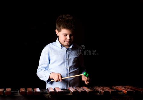 Boy Playing On Xylophone Stock Photo Image Of Xylophone 65828466