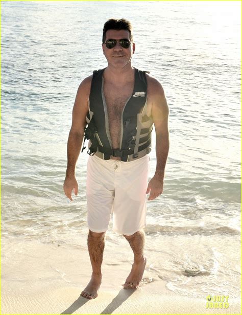 Simon Cowell Shirtless New Years Eve With Mezhgan Huissany Photo