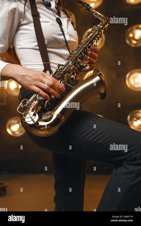 Female Saxophonist Plays The Saxophone On Stage Stock Photo Alamy