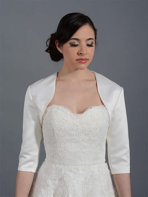I seriously couldn't handle how awesome the faux fur looked and how it really helped us stay warm since we had an outdoor wedding. Ivory 3/4 sleeve wedding satin bolero jacket Satin009_Ivory