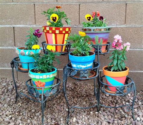 My Painted Terra Cotta Pots Filled With Flowers Painted Flower Pots