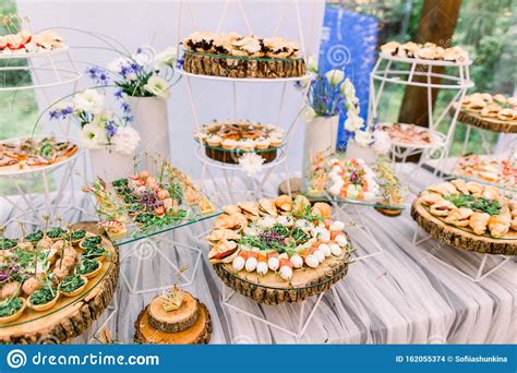 As the costs of weddings rise, many people's budgets aren't large enough to accommodate all the wants and needs of a traditional wedding. Catering Buffet And Rustic Decor, Outdoor Wedding Party ...