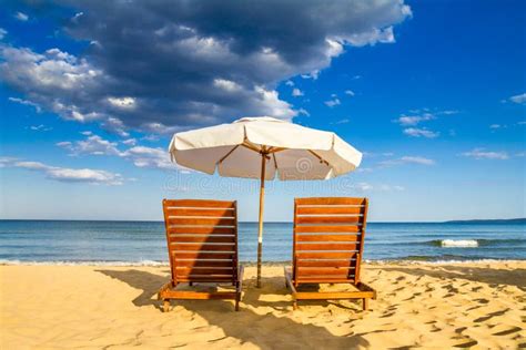Coastal Landscape Beach Umbrellas And Loungers On The Sandy Seashore Stock Photo Image Of
