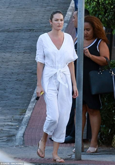 Candice Swanepoel Dons White Linen Jumpsuit In Brazil Daily Mail Online