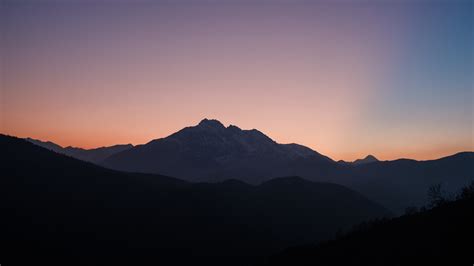 Download 2560x1440 Wallpaper Mountains Sunset Clean Skyline Mist