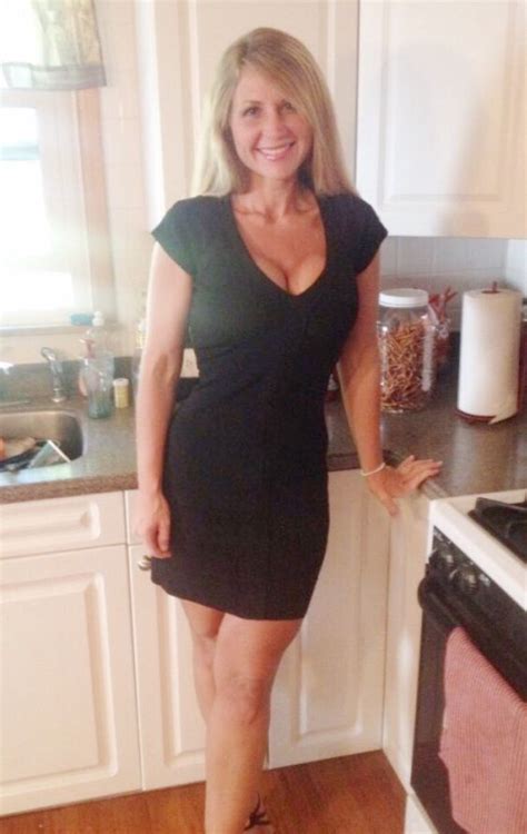 Beautiful Blond Milf In Sexy Black Dress In Kitchen Find Her