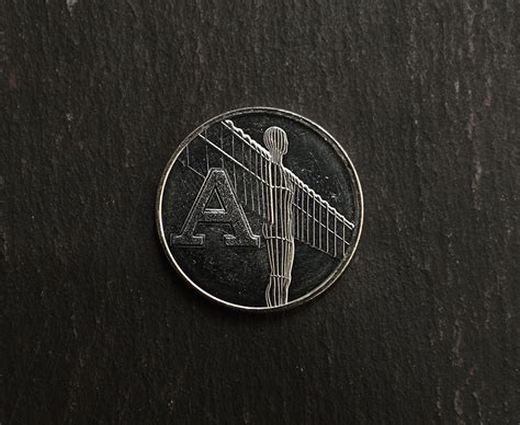 Benjamin bunny beatrix potter 50p collectors coins 50p | etsy. Coin news: Alphabet 10p coin released into circulation by ...