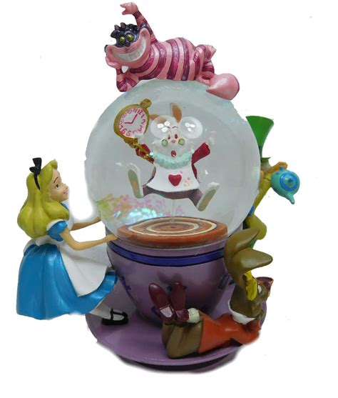 Man sieht leider gebrauchsspuren auf der disc. Disney Disneyland Paris Figur Schneekugel Alice im ...