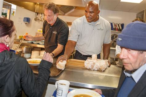 Boxing Legend Evander Holyfield Proves A Smash Hit As He Serves Up