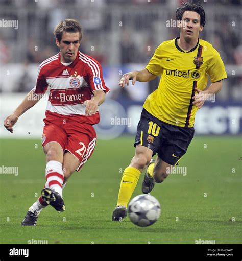 Munich S Philipp Lahm L Fights For The Ball With Barcelona S Lionel