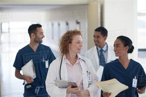 Hospital Staff Talking In Hallway Stock Photo Dissolve