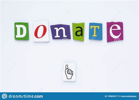 Word Donate From Cut Letters On White Background Donation Concept A