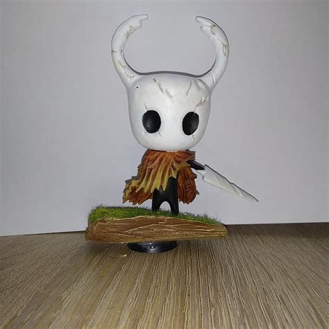 Epic hollow knight figure with a stand : 3D Printable Epic Hollow Knight figure with a stand : The ...