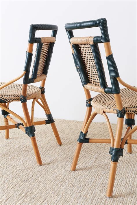 Can't see the style of rattan bistro chair you're looking for? Pair of Palecek Bamboo Rattan Bistro Cafe Chairs at 1stdibs