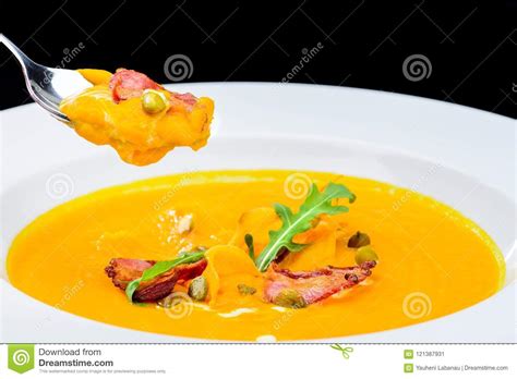 An appetizing store, typically in reference to jewish cuisine in new york city, particularly ashkenazi jewish cuisine, is a store that sells food that generally goes with bagels. Process Of Eating Delicious And Appetizing Pumpkin Cream Soup Wi Stock Image - Image of cuisine ...