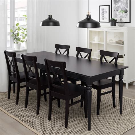 Dining tables are the heroes of the home. INGATORP Extendable table, black, Length: 61" - IKEA ...