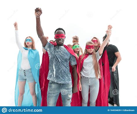 Confident Team Of Superheroes Standing In A Bright Office Stock Image