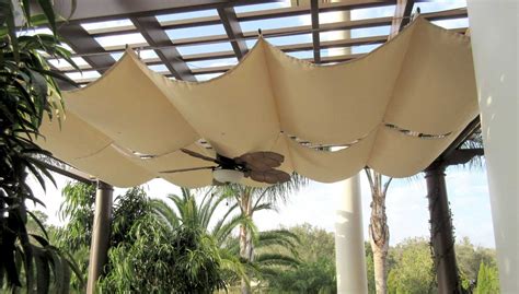 Retractable canopies are versatile shading structures that retract manually, with a host of fabric choices that match your home décor to create a comfortable outdoor space! Retractable Pergola Covers