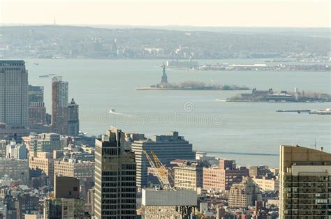 Aerial View Of Manhattan Buildings Skyscrapers Hudson River And Lady