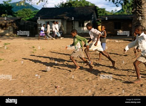 African Children Playing Soccer Barefoot Hi Res Stock Photography And