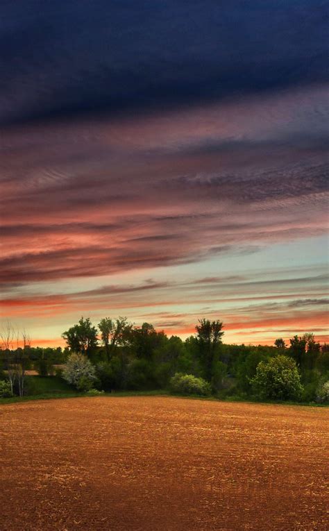 Download Wallpaper 950x1534 Clouds Sunset Sky Nature Landscape