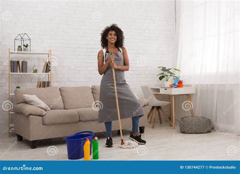 Black Woman Smiling With Mop And Bucket Stock Image Image Of Apron